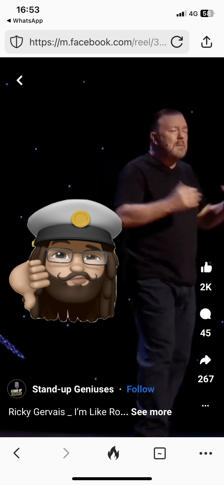 A screenshot of a video of Ricky Gervais doing standup with an emoji with a captain's hat, glasses and a beard giving thumbs d0wn